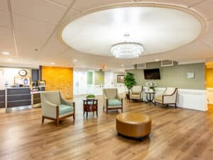 Greenville Post Acute Lobby with chairs and wooden floor